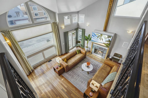 Gorgeous views down to the living space from the open third-floor hallway.