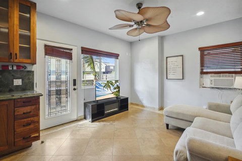 The ground-floor lounge doubles as a chill-out zone or staging area for your outdoor grilling nights
