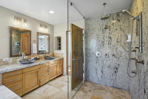 Roll-in shower in the ensuite bathroom—stylish and practical.