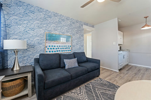Living Room with Smart TV, Dining Table, Sofa Sleeper