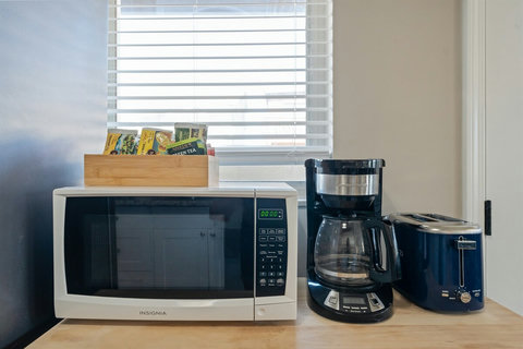Kitchen with gas range, Full-size refrigerator and plenty of essentials