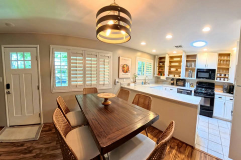 Dedicated dining and full kitchen at Haus144, perfect for extended stays.