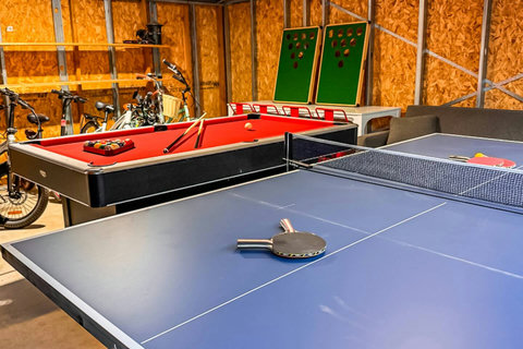 Challenge your crew to ping pong, pool, or cornhole before cruising the town