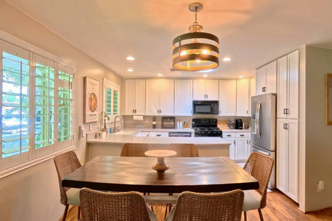 Bright, open kitchen and dining area at Haus144.