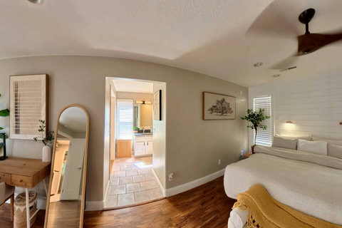 Our main bedroom retreat has it all: ensuite bath and dedicated workspace.