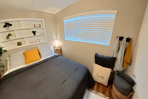 A king-size bed, built-ins, and thoughtful details to make extended stays effortless.