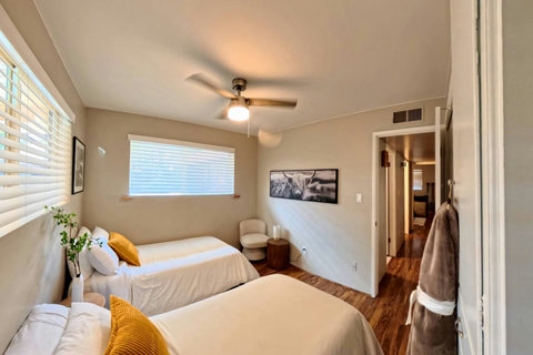 Bedroom 3 has 2 twin beds + 2 twin rollaway beds.