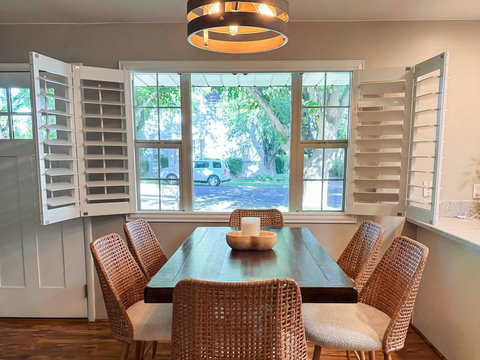 Soft light and wood tones define our contemporary casual dining area.