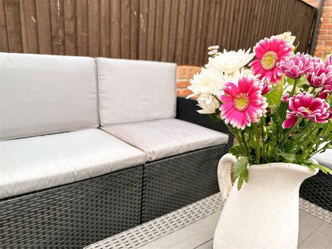 Outdoor space with garden furniture.