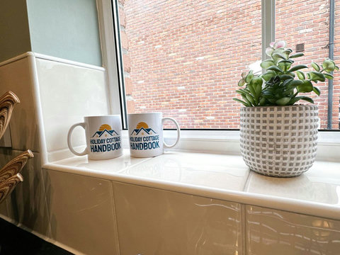 Kitchen featuring oven, hob, fridge-freezer, washer-drier, kettle, toaster, and many other amenities.