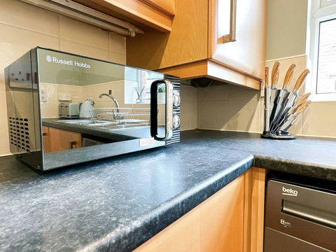 Kitchen featuring oven, hob, fridge-freezer, washer-drier, kettle, toaster, and many other amenities.