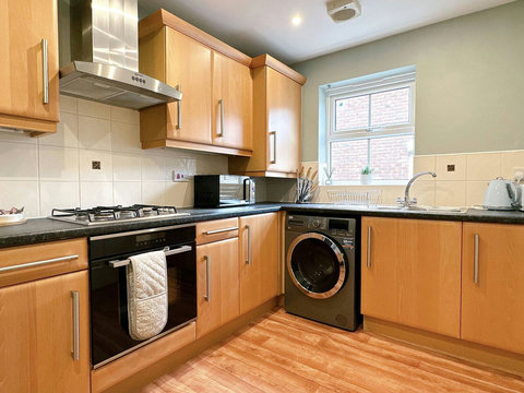 Kitchen featuring oven, hob, fridge-freezer, washer-drier, kettle, toaster, and many other amenities.