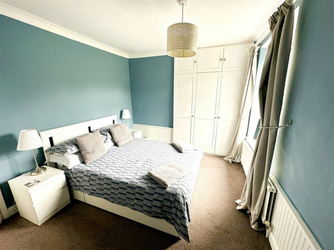 Main bedroom, double bed, bedside tables, view of the church, wardrobe space, etc.