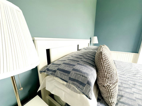 Main bedroom, double bed, bedside tables, view of the church, wardrobe space, etc.