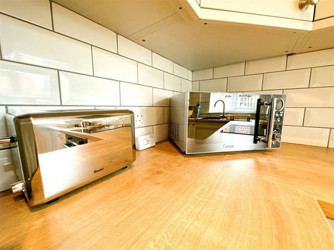 Kitchen, fridge-freezer, oven, hob, microwave, washer-drier, dishwasher, table and chairs, etc.