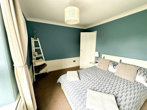Main bedroom, double bed, bedside tables, view of the church, wardrobe space, etc.