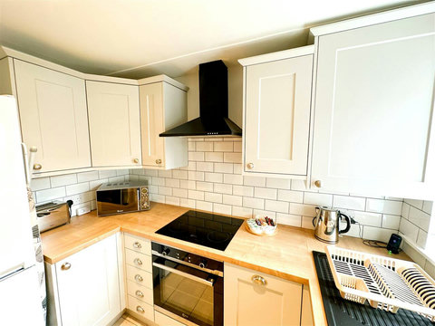Kitchen, fridge-freezer, oven, hob, microwave, washer-drier, dishwasher, table and chairs, etc.