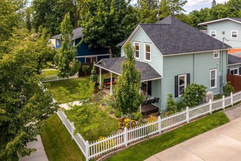 Lush Green Yard Completely Fenced In For Your Toddlers Or Furry Friends
