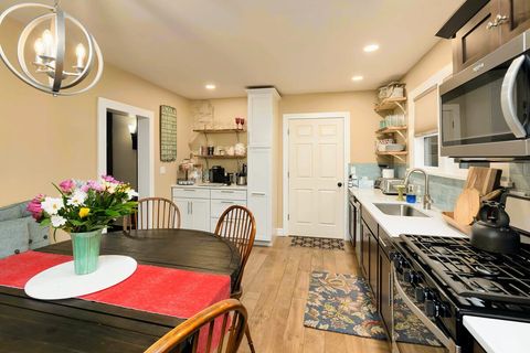 Door Leads to the Mudd Room With A Brand New Stackable Washer/Dryer 
(Direct Access To The Back Patio Amenities)