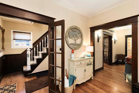 A View From The Living Room
-Stairs Leading to the bedrooms
-Hallway Leading towards the Den (4th bedroom) & Kitchen & Bath