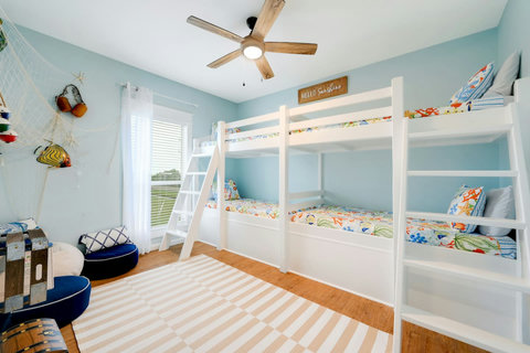 Bunk room with four built-in bunks