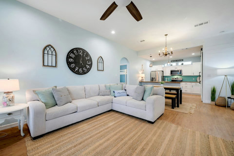 Living room opens to the dining area and kitchen