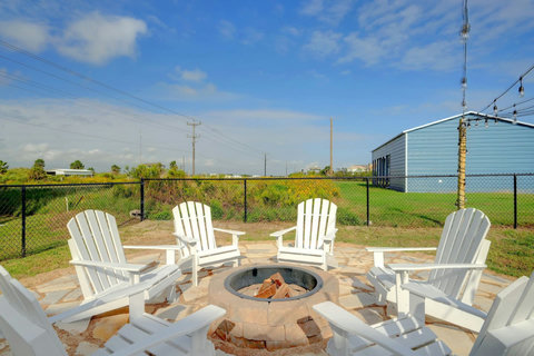 Adirondack chairs around the fire pit