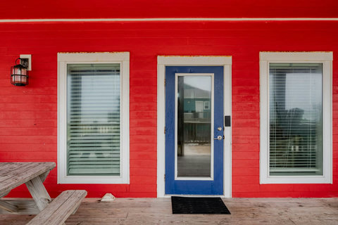 Front door opens to the covered deck