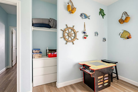 Arcade machine and storage in the bunk room