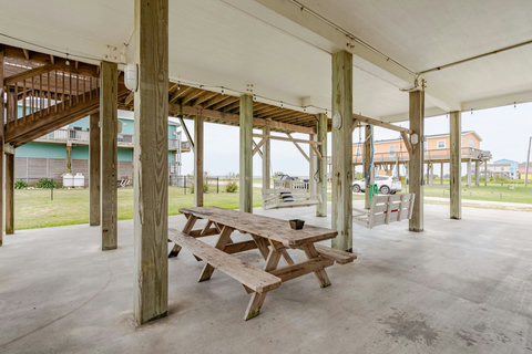 Picnic tables under the house for lunch in the shade