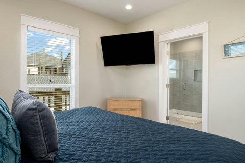 King bedroom with a view of the shower