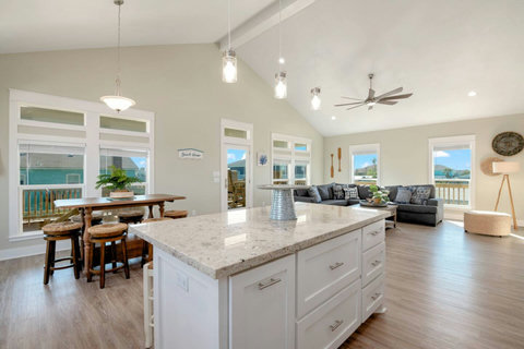 Granite island with views of the living room