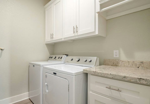 Laundry room with washer and dryer