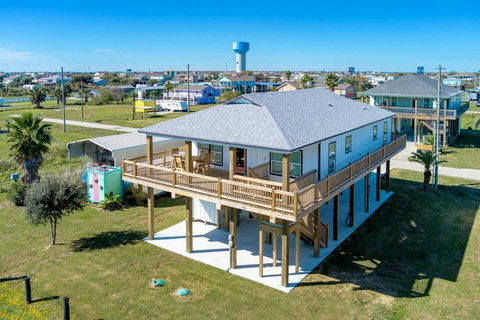 Raised beach house with a big wraparound deck