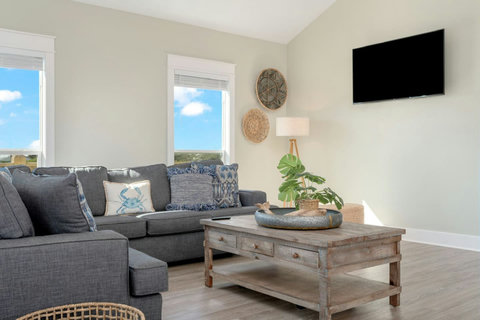 Comfy sectional with coastal decor