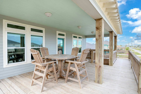 Covered deck with a dining table