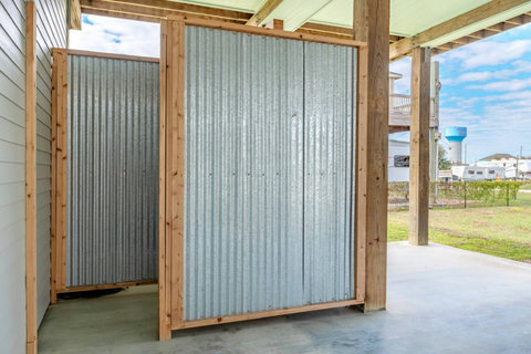 Outdoor shower under the house