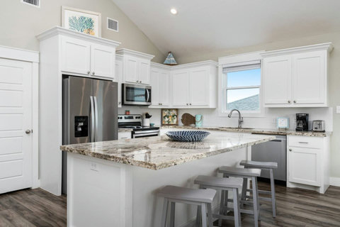 White kitchen with granite counters