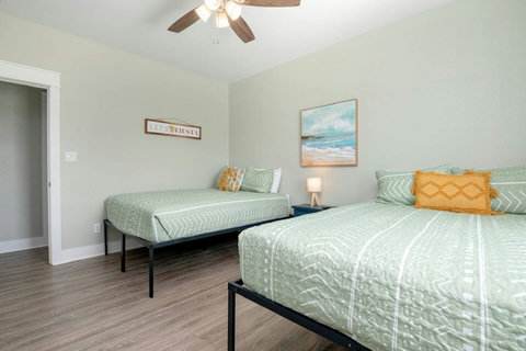 Queen bedroom with plenty of light