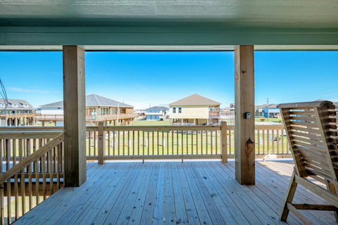 Tall deck chairs on the covered deck