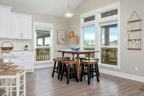 High-top dining table by the windows