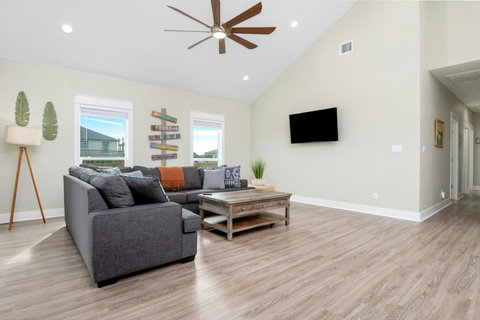 Living room open to the hallway
