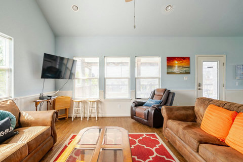Sofas and a recliner for movie nights