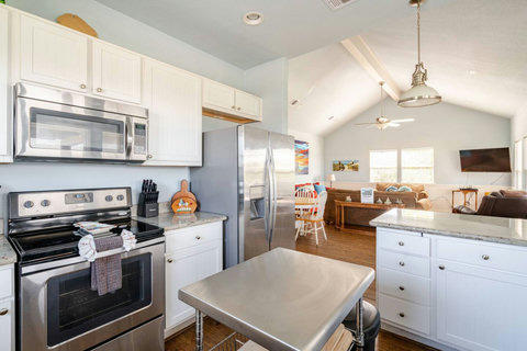 Kitchen with a view of the living room