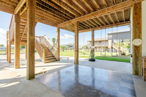Patio with stairs up to the decks