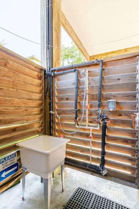Outdoor shower and rinse sink