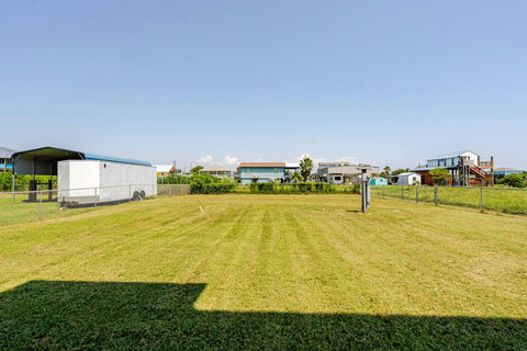 Open green space behind the house
