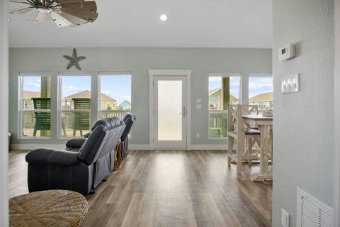 Recliner sofa and deck door