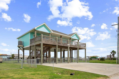 Covered deck and fenced yard