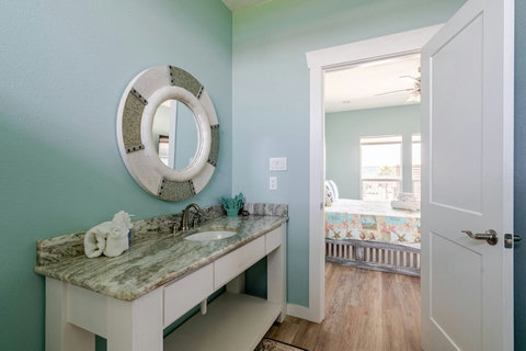 Bath vanity next to the king bedroom